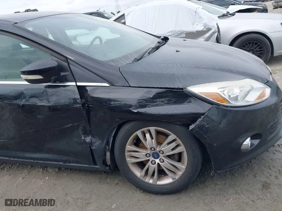 2012 Ford Focus SEL with VIN 1FAHP3M2XCL363037, listed as a IAAI auction lot 41816361 with 101,693 mi miles. Bid and sale history available at carsss.com. Image 6.