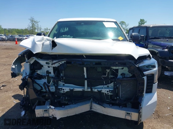 2023 Toyota Tundra SR with VIN 5TFKB5DB0PX065072, listed as a IAAI auction lot 42226348 with 53,539 mi miles and . Bid and sale history available at DreamBid. Image 12.