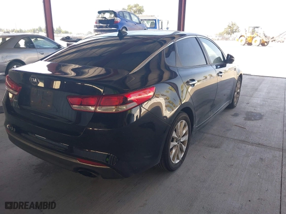 2016 Kia Optima LX with VIN 5XXGT4L33GG064125, listed as a IAAI auction lot 39506983 with 131,976 mi miles. Bid and sale history available at carsss.com. Image 4.
