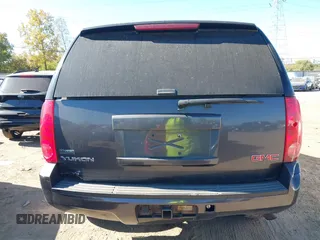 2011 GMC Yukon SLE with VIN 1GKS2AE04BR207818, listed as a IAAI auction lot 40669731 with 312,959 mi miles. Bid and sale history available at carsss.com. Image 16.