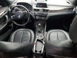 2018 BMW X1 xDrive28i with VIN WBXHT3C31J5F89068, listed as a Copart auction lot 52266655 with 145,375 mi miles and Clean Title. Bid and sale history available at carsss.com. Image 8.