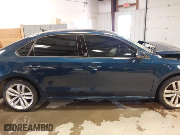 2019 Volkswagen Passat 2.0T Wolfsburg Edition with VIN 1VWLA7A30KC008917, listed as a IAAI auction lot 40791328 with 63,747 mi miles. Bid and sale history available at carsss.com. Image 14.