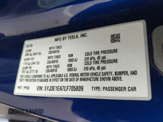 2020 Tesla Model 3 Standard Range Plus z VIN 5YJ3E1EA7LF705809, wystawiony jako IAAI lot #42146416 z przebiegiem 52 056 mil mil oraz . Historia ofert i sprzedaży dostępna na DreamBid. Obrazek 9.