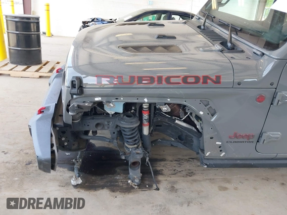 2022 Jeep Gladiator Rubicon with VIN 1C6JJTBG6NL166081, listed as a IAAI auction lot 42204431 with 40,568 mi miles and . Bid and sale history available at DreamBid. Image 6.