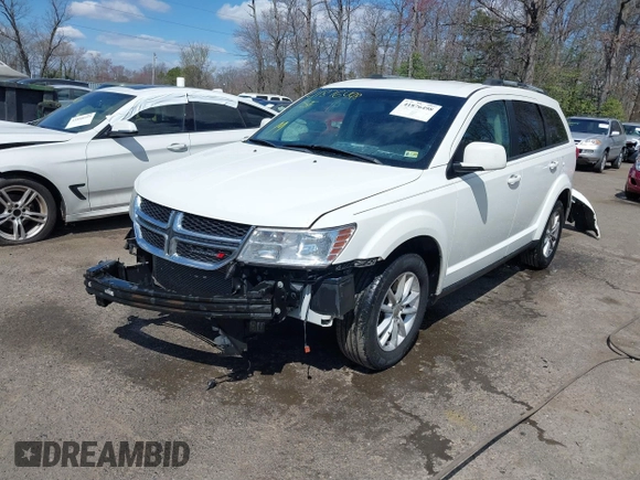 2017 Dodge Journey SXT with VIN 3C4PDCBB5HT564454, listed as a IAAI auction lot 41876498 with 198,035 mi miles and . Bid and sale history available at DreamBid. Image 2.