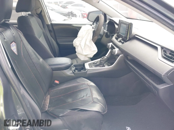 2020 Toyota RAV4 Hybrid XLE with VIN 2T3RWRFV5LW058103, listed as a IAAI auction lot 42665299 with 112,634 mi miles and . Bid and sale history available at DreamBid. Image 5.