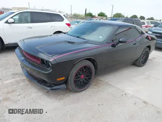 2012 Dodge Challenger SXT Plus with VIN 2C3CDYAG5CH268607, listed as a IAAI auction lot 41982122 with 188,091 mi miles. Bid and sale history available at carsss.com. Image 2.