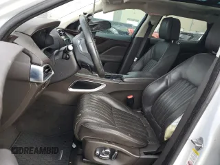 2018 Jaguar F-Pace 30t Portfolio with VIN SADCN2GXXJA321914, listed as a Copart auction lot 84450544 with 115,374 mi miles and Salvage title. Bid and sale history available at DreamBid. Image 7.