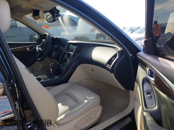 2014 Infiniti Q50 Premium with VIN JN1BV7AP0EM687787, listed as a IAAI auction lot 42084288 with 109,499 mi miles and . Bid and sale history available at carsss.com. Image 5.