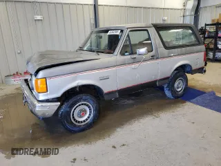 1987 Ford Bronco z VIN 1FMDU15Y1HLA18796, wystawiony jako Copart lot #46362585 z przebiegiem 44 356 mil mil oraz Czysty tytuł • Clean title. Historia ofert i sprzedaży dostępna na DreamBid. Obrazek 1.