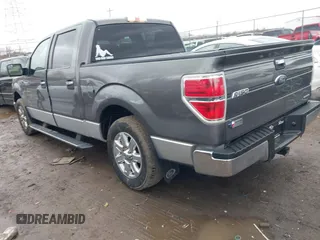 2013 Ford F-150 XL with VIN 1FTFW1CF5DKE32897, listed as a IAAI auction lot 41665756 with 101,574 mi miles. Bid and sale history available at carsss.com. Image 3.