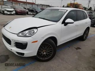 2017 Porsche Cayenne with VIN WP1AA2A24HKA81225, listed as a Copart auction lot 68863544 with 80,828 mi miles and Salvage title. Bid and sale history available at DreamBid. Image 1.
