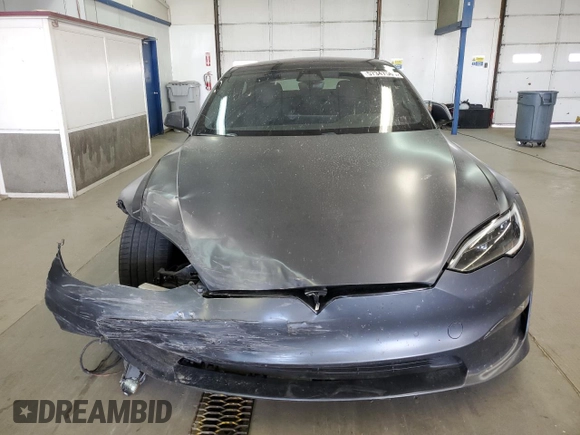 2022 Tesla Model S с VIN 5YJSA1E5XNF488415, выставлен на аукционе Copart как лот 57347565 с пробегом 18 662 миль миль и Списание • Salvage title. История ставок и продаж доступна на DreamBid. Изображение 11.