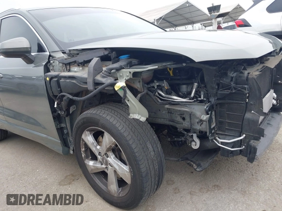 2020 Audi Q3 Premium with VIN WA1AECF32L1061271, listed as a IAAI auction lot 42038795 with 23,902 mi miles and . Bid and sale history available at DreamBid. Image 19.