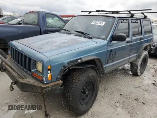 1999 Jeep Cherokee Sport z VIN 1J4FF68S4XL567848, wystawiony jako Copart lot #43222045 z przebiegiem 280 178 mil mil oraz Szkoda całkowita • Salvage title. Historia ofert i sprzedaży dostępna na DreamBid. Obrazek 1.