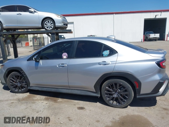 2022 Subaru WRX Premium with VIN JF1VBAF62N9028683, listed as a IAAI auction lot 42227871 with 21,234 mi miles and . Bid and sale history available at DreamBid. Image 14.