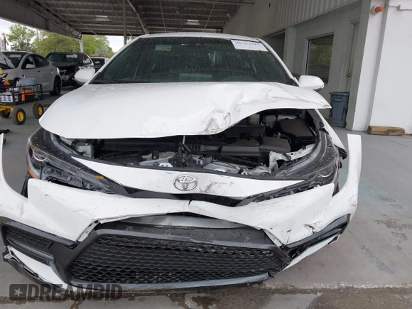 2021 Toyota Corolla SE with VIN 5YFS4MCE7MP059926, listed as a IAAI auction lot 41732717 with 48,583 mi miles and . Bid and sale history available at carsss.com. Image 12.