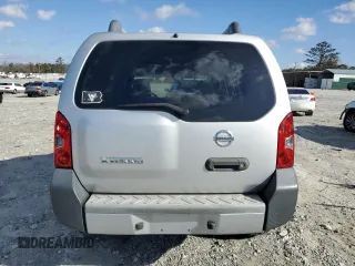 2010 Nissan Xterra S with VIN 5N1AN0NU2AC523002, listed as a Copart auction lot 87229904 with 93,356 mi miles and Salvage title. Bid and sale history available at DreamBid. Image 6.
