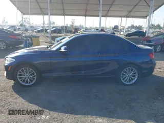 2015 BMW 2 Series 228i xDrive with VIN WBA1F7C5XFV367287, listed as a IAAI auction lot 40802463 with 113,427 mi miles and . Bid and sale history available at carsss.com. Image 14.