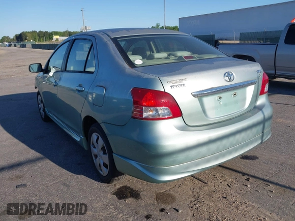 2007 Toyota Yaris with VIN JTDBT923371029654, listed as a IAAI auction lot 42142361 with 296,107 mi miles. Bid and sale history available at carsss.com. Image 3.