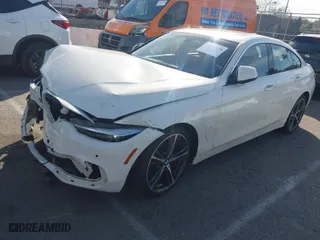 2019 BMW 4 Series 430i with VIN WBA4J1C5XKBM17786, listed as a IAAI auction lot 41597430 with 66,106 mi miles. Bid and sale history available at carsss.com. Image 2.