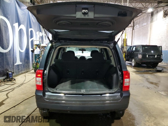 2014 Jeep Patriot Latitude with VIN 1C4NJRFB7ED884812, listed as a Copart auction lot 47580245 with 123,780 mi miles and Clean Title. Bid and sale history available at carsss.com. Image 6.