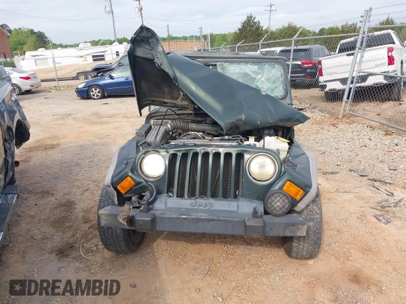 2004 Jeep Wrangler X z VIN 1J4FA39S84P714902, wystawiony jako IAAI lot #42011039 z przebiegiem Nie podano mil oraz . Historia ofert i sprzedaży dostępna na DreamBid. Obrazek 11.