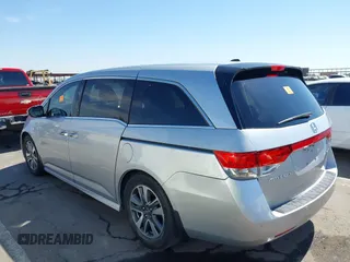 2014 Honda Odyssey Touring с VIN 5FNRL5H98EB070983, выставлен на аукционе IAAI как лот 42328380 с пробегом Не указан миль и . История ставок и продаж доступна на DreamBid. Изображение 3.