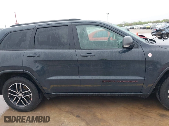 2018 Jeep Grand Cherokee Trailhawk with VIN 1C4RJFLG6JC320763, listed as a IAAI auction lot 41871683 with 115,417 mi miles and . Bid and sale history available at DreamBid. Image 13.