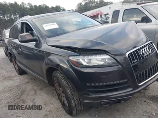 2014 Audi Q7 3.0T Premium Plus with VIN WA1LGAFE1ED006143, listed as a IAAI auction lot 41510568 with 155,444 mi miles. Bid and sale history available at carsss.com. Image 1.