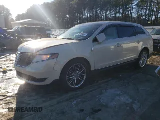 2014 Lincoln MKT EcoBoost with VIN 2LMHJ5AT2EBL55926, listed as a Copart auction lot 87234824 with 144,164 mi miles and Salvage Title. Bid and sale history available at DreamBid. Image 1.