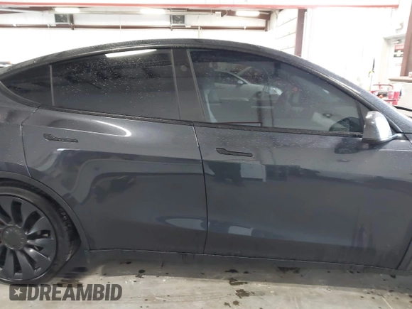 2024 Tesla Model Y Performance with VIN 7SAYGDEFXRF049338, listed as a IAAI auction lot 41240812 with 10,132 mi miles and . Bid and sale history available at DreamBid. Image 13.