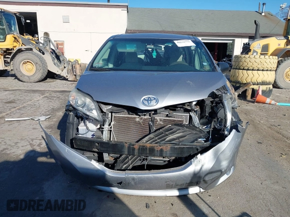 2012 Toyota Sienna with VIN 5TDKA3DC7CS015592, listed as a IAAI auction lot 40839775 with 161,944 mi miles and . Bid and sale history available at DreamBid. Image 13.