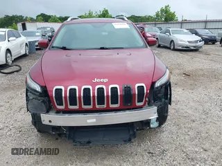 2016 Jeep Cherokee Altitude with VIN 1C4PJMCB5GW321829, listed as a IAAI auction lot 42478298 with 64,029 mi miles and . Bid and sale history available at DreamBid. Image 13.