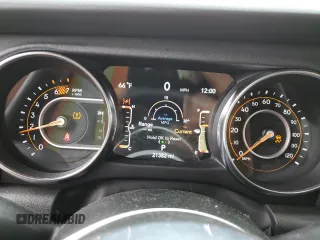 2023 Jeep Wrangler Sahara z VIN 1C4HJXEG9PW544275, wystawiony jako Copart lot #59932585 z przebiegiem 21 382 mil mil oraz Szkoda całkowita • Salvage title. Historia ofert i sprzedaży dostępna na DreamBid. Obrazek 9.
