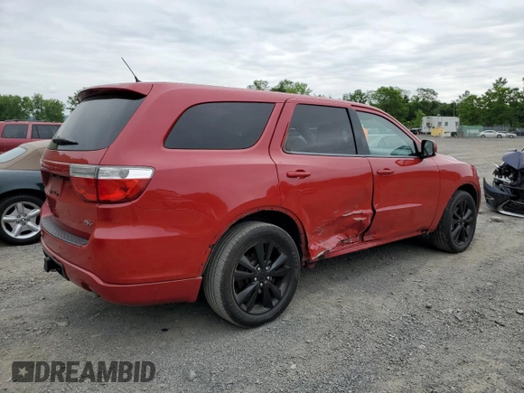2013 Dodge Durango R/T with VIN 1C4SDJCTXDC688165, listed as a Copart auction lot 61071195 with 139,075 mi miles and Salvage title. Bid and sale history available at DreamBid. Image 3.
