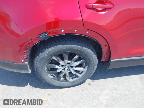 2016 Mazda CX-9 Touring with VIN JM3TCBCY5G0104504, listed as a IAAI auction lot 42314649 with 116,536 mi miles and . Bid and sale history available at DreamBid. Image 6.