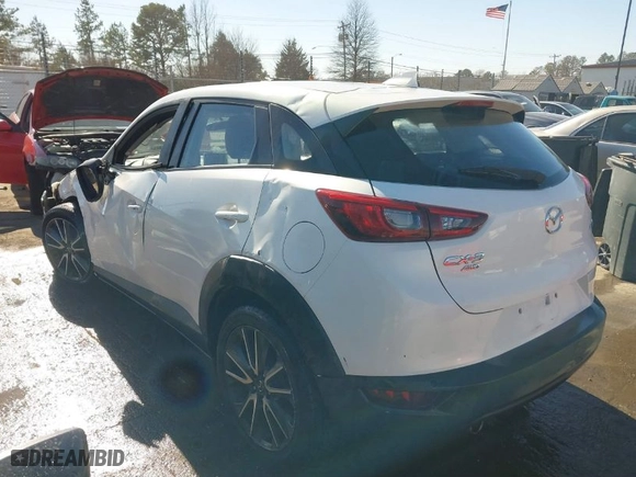 2017 Mazda CX-3 Touring with VIN JM1DKFC7XH0179294, listed as a IAAI auction lot 41641510 with 95,154 mi miles. Bid and sale history available at carsss.com. Image 3.