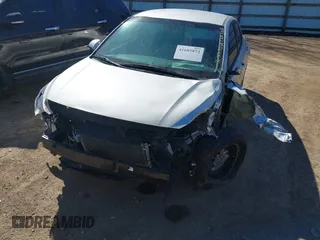 2022 Kia Rio S with VIN 3KPA24AD2NE447421, listed as a IAAI auction lot 41682873 with 52,963 mi miles. Bid and sale history available at carsss.com. Image 6.