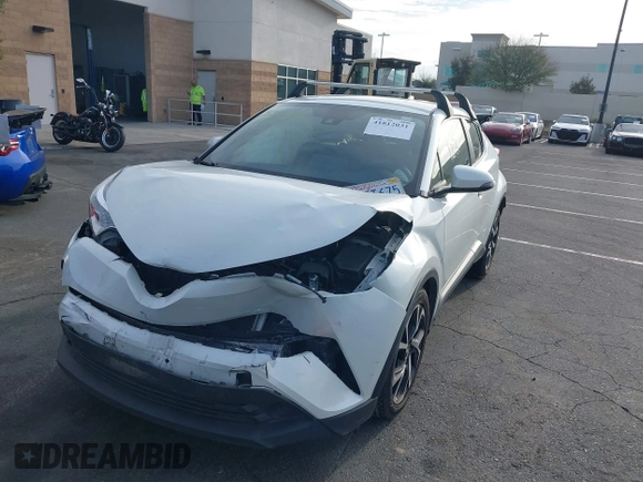 2019 Toyota C-HR XLE with VIN JTNKHMBX4K1040772, listed as a IAAI auction lot 41812031 with 79,729 mi miles. Bid and sale history available at carsss.com. Image 6.