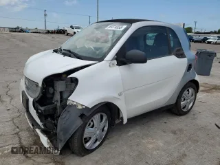 2016 Smart fortwo Passion with VIN WMEFJ5DAXGK084125, listed as a Copart auction lot 59374855 with 63,826 mi miles and Salvage title. Bid and sale history available at DreamBid. Image 1.