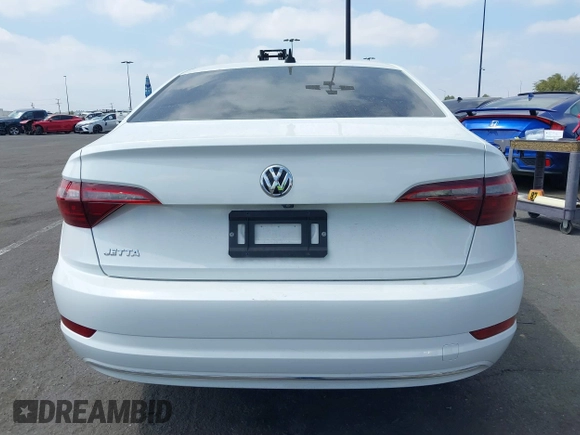 2020 Volkswagen Jetta SEL z VIN 3VWEB7BU6LM037447, wystawiony jako IAAI lot #41905020 z przebiegiem 42 179 mil mil oraz . Historia ofert i sprzedaży dostępna na DreamBid. Obrazek 17.