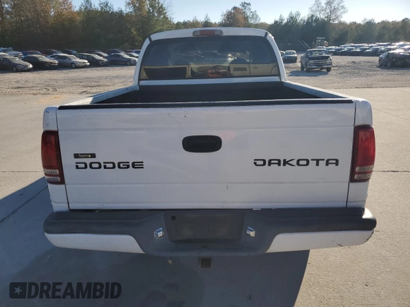 2004 Dodge Dakota Sport with VIN 1D7HL38K34S561259, listed as a Copart auction lot 83047884 with 118,565 mi miles and Salvage Title. Bid and sale history available at carsss.com. Image 6.