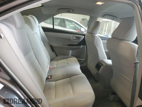 2015 Toyota Camry LE z VIN 4T1BD1FK1FU172465, wystawiony jako Copart lot #60708715 z przebiegiem 217 544 mil mil oraz Czysty tytuł • Clean title. Historia ofert i sprzedaży dostępna na DreamBid. Obrazek 10.