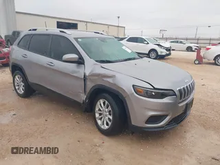 2021 Jeep Cherokee Latitude with VIN 1C4PJLCB7MD134643, listed as a IAAI auction lot 40922669 with 58,217 mi miles. Bid and sale history available at carsss.com. Image 1.