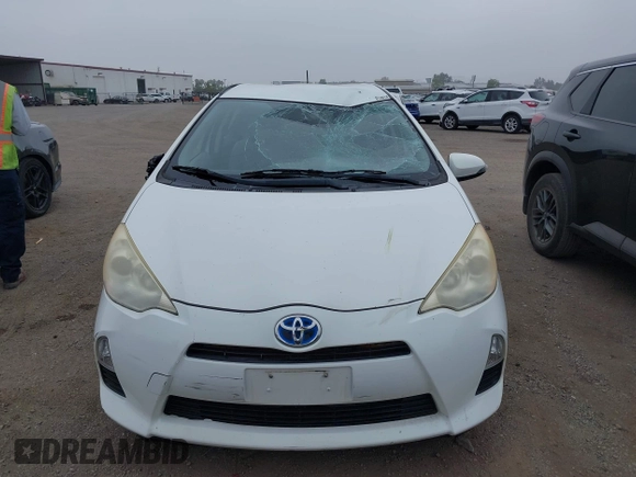 2014 Toyota Prius One z VIN JTDKDTB33E1559405, wystawiony jako IAAI lot #42499928 z przebiegiem 182 388 mil mil oraz . Historia ofert i sprzedaży dostępna na DreamBid. Obrazek 6.