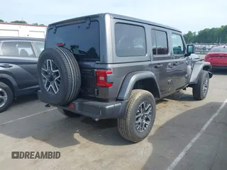 2025 Jeep Wrangler Sahara with VIN 1C4PJXEN5SW525130, listed as a IAAI auction lot 42174096 with 5,387 mi miles and . Bid and sale history available at DreamBid. Image 4.