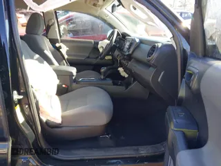 2018 Toyota Tacoma SR with VIN 5TFCZ5ANXJX124991, listed as a IAAI auction lot 41136867 with 57,980 mi miles and . Bid and sale history available at carsss.com. Image 5.