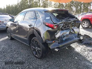 2021 Mazda CX-30 Premium with VIN 3MVDMBDY2MM239231, listed as a IAAI auction lot 41655159 with 22,679 mi miles and . Bid and sale history available at carsss.com. Image 3.