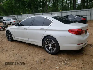 2018 BMW 5 Series 530i with VIN WBAJA5C53JG898430, listed as a Copart auction lot 54243195 with 129,854 mi miles and Salvage title. Bid and sale history available at DreamBid. Image 2.